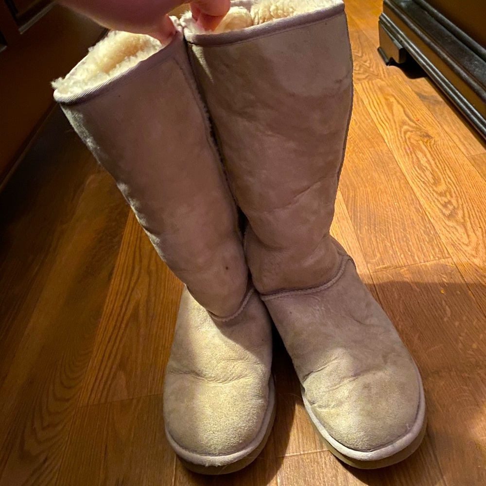 Tall Ugg boots in the color sand